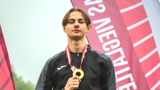 Elans Bertmanis ar medaļu