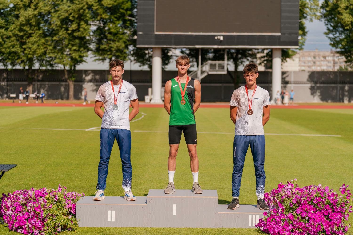 Sportisti uz pjedestāla