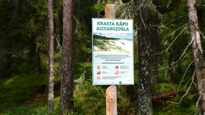 Informatīvā zīme par aizsargājamo kāpu teritoriju