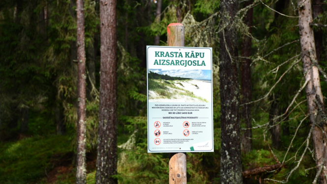 Informatīvā zīme par aizsargājamo kāpu teritoriju